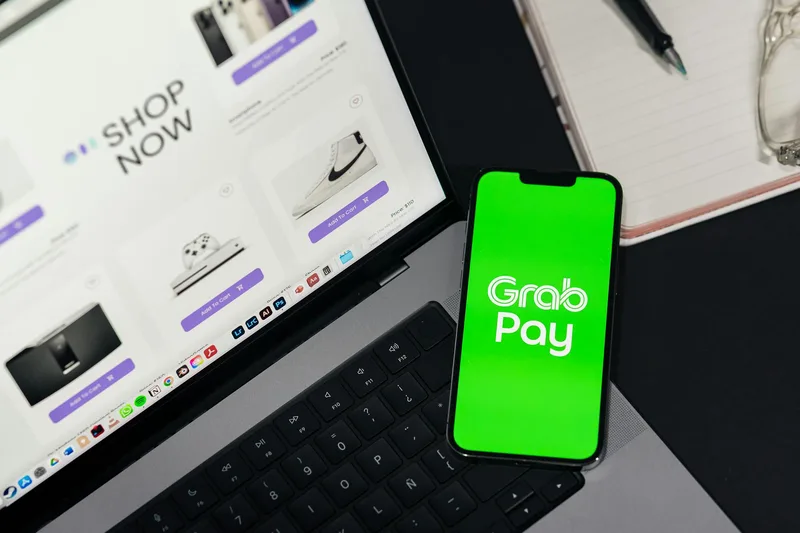 Three mobile phone screens showing SPayLater checkout on Shopee, Kredivo payment option on Tokopedia, and Akulaku instalment selection on Lazada for Indonesian merchant BNPL comparison