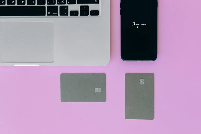 Laptop and cards showing online payment and installment options